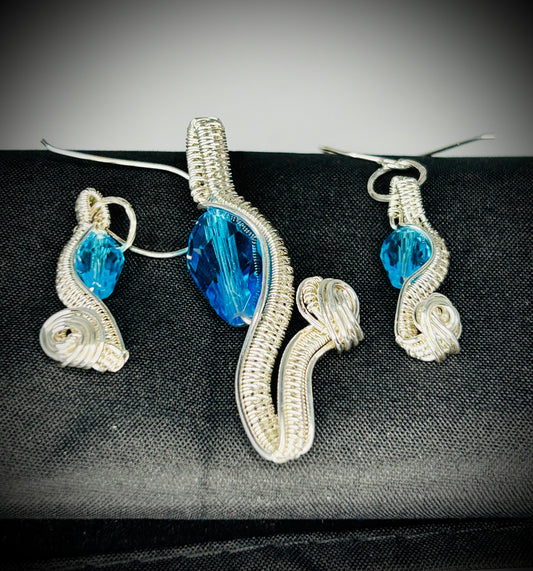 Silver Flower Pendant and Earrings Set.